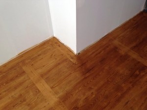 Nettoyer un parquet en bois ciré